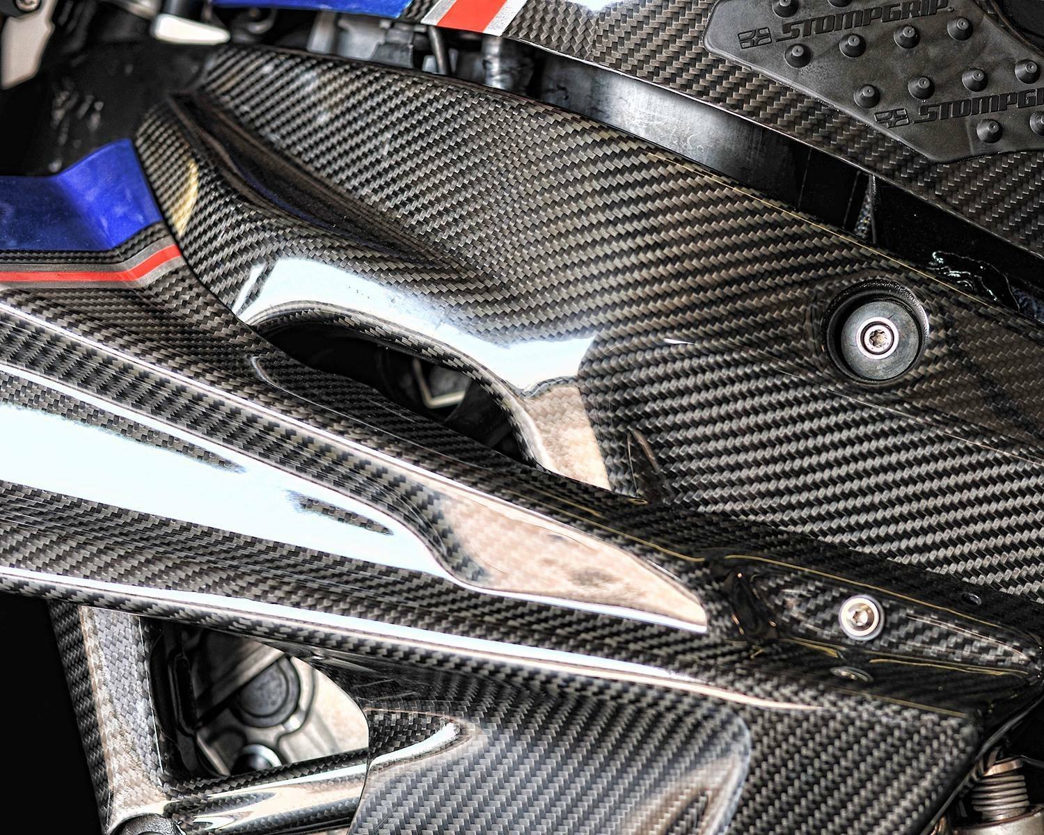 Close-up of carbon fiber race bike bodywork and vent opening